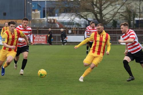 Enfields Josh Davison (L) and Billy Bricknell and Kingstonians James OHalloran and Tom Bird (R)