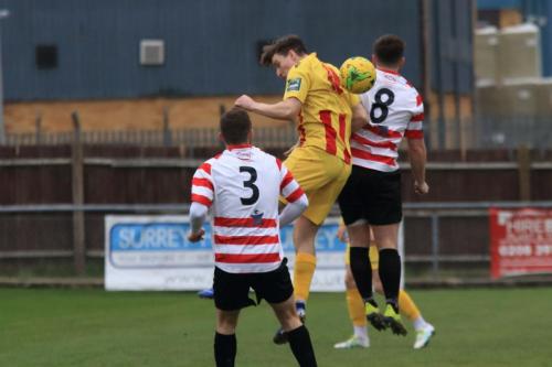 Enfields Josh Davison and Kingstonians James OHalloran (3) and Aaron Lamont