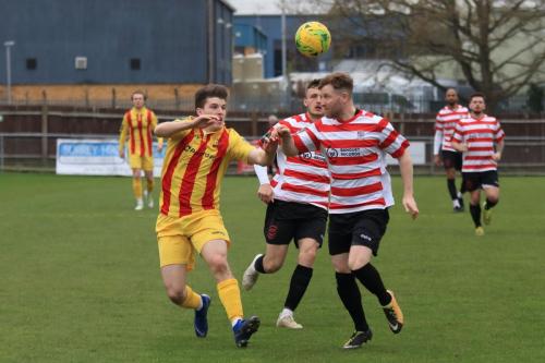 Enfields Josh Davison and LKingstonians James Richmond (R) and James OHalloran