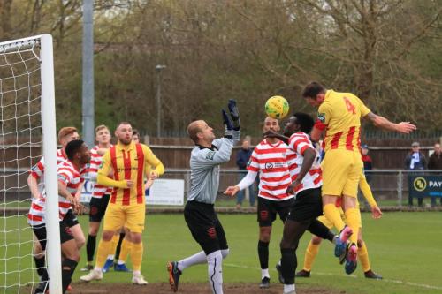Enfields Matt Johnson (4) heads on goal