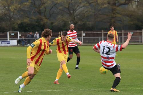 Enfields Sam Chaney shoots against the post
