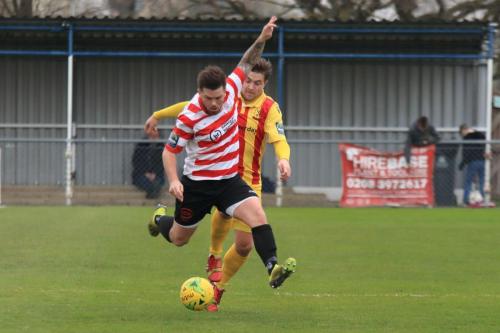 Kingstonains Aaron Lamont (L) and Enfields Lewis Taaffe