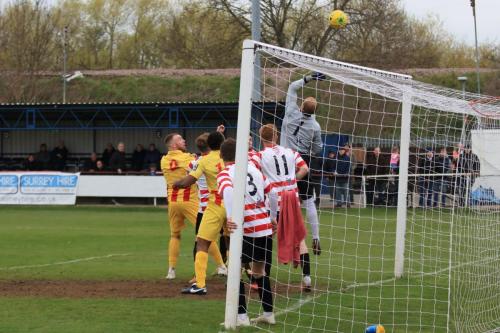 Kingstonian keeper Rob Tolfrey tips the ball over the bar