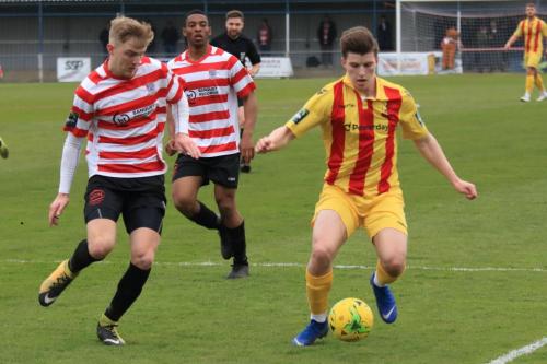 Kingstonians James Richmond (L) and Jonathan Muleba and Enfields Josh Davison