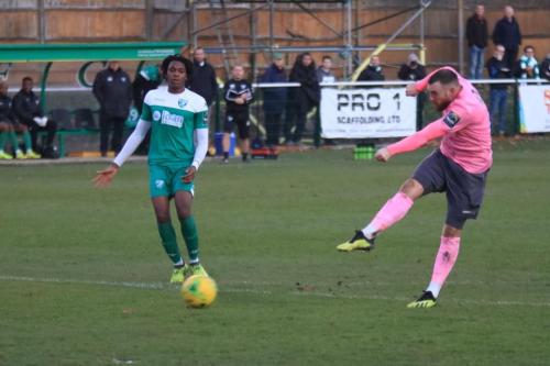 Enfields Billy Bricknell shoots, watched by Crossley Lema