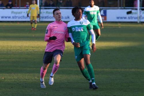 Enfields Brandon Adams (L) and Leatherheads Crossley Lema