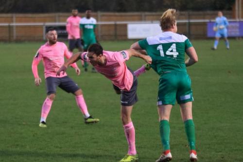 Enfields Matt Johnson (L) challenegs Charlie Wassmer