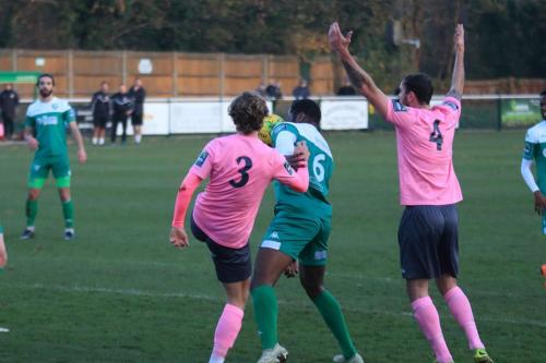 Enfields Mickey Parcell (3) challenges Jerry Nnamani as Matt Johnson appeals for a free kick