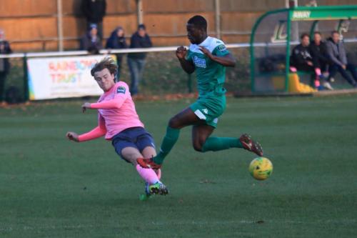 Enfields Mickey Parcell (L) tackles Travis Gregory