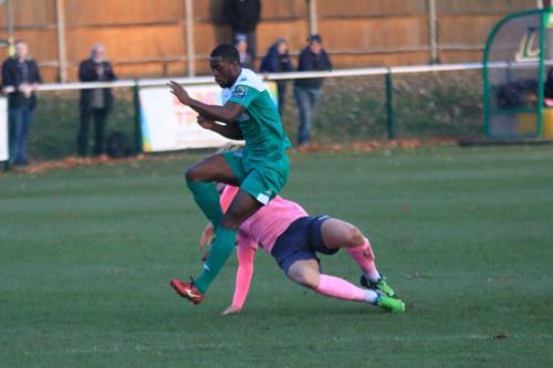 Enfields Mickey Parcell (pink) tackles Travis Gregory