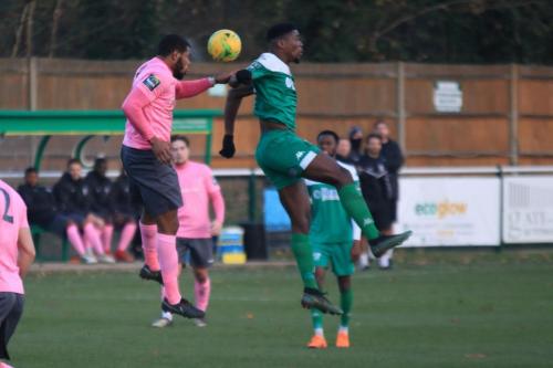 Enfields Taofiq Olomowewe (L) and Leatherheads Shaun Okojie