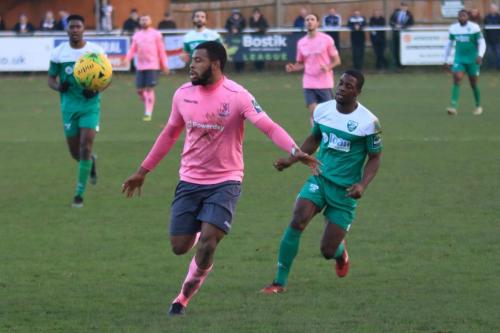 Enfields Taofiq Olomowewe (L) and Leatherheads Travis Gregory