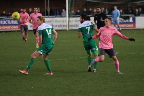 Leatherheads Charle Wassmer (14) and Dan Gallagher and Enfields Brandon Adams