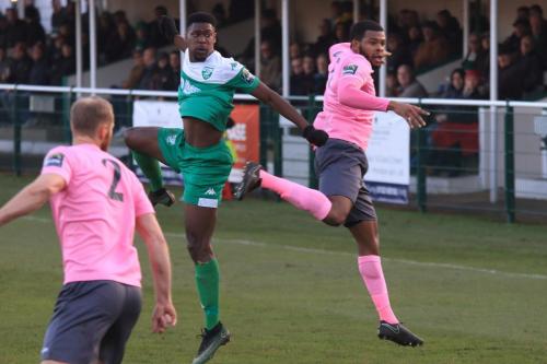 Leatherheads Shaun Okojie (green) challenges Taofiq Olomowewe