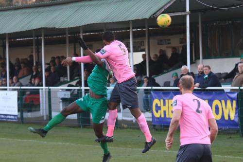 Leatherheads Shaun Okojie (green) challenges Taofiq Olomowewex
