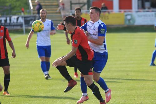 Enfields Brandon Adams (R) challenges Steve Brinkhurst