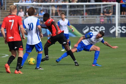 Enfields Matt Johnson (R) makes a desperate attempt to stop Omarr Lawson