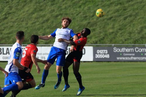 Enfields Remi Sutton wins a challenge against Michael Dome-Bemwin (R)