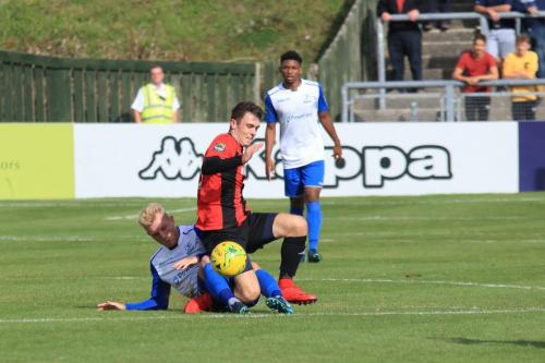 Enfields Ryan Blackman picks up a yellow card for a tackle from behind on Charlie Coppola  His immediate appeal to the referee can only be because he was worried it might have been red