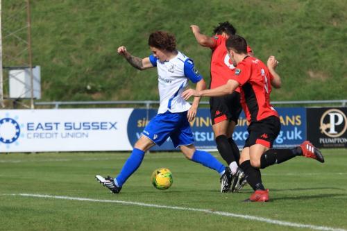 Enfields Sam Chaney chased by Leon Redwood and Steve Brinkhurst (R)