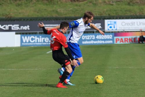 Lewes Charlie Coppola (L) and Enfields Remi Sutton