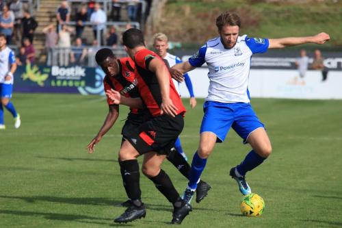 Lewes Frankie Chappell (front) and Omarr Lawson and Enfields Remi Sutton