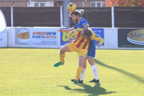 Enfields Aaron Greene (L) and Lowestofts Adam Tann