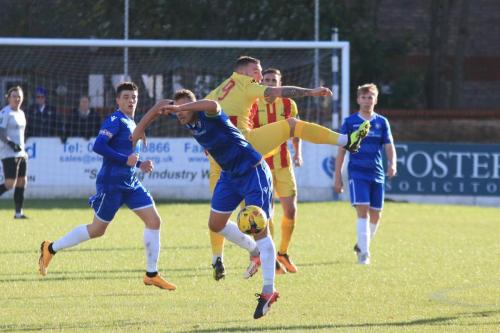 Enfields Billy Bricknell (9) challenges Rossi Jarvis