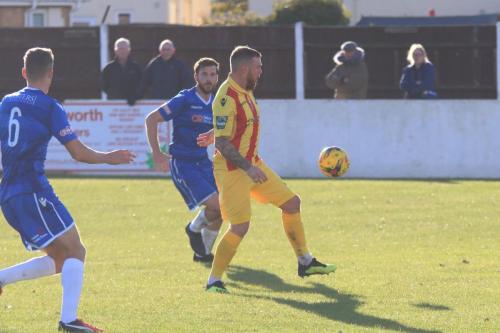 Enfields Billy Bricknell and Lowestofts Matt Castellan (L) and Adam Tann