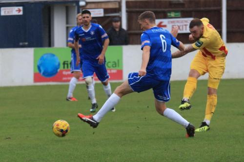 Enfields Billy Bricknell shoots past Rossi Jarviss block