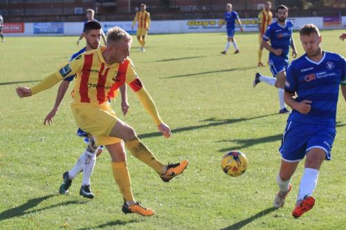 Enfields Ryan Blackman (yellow) and Lowestofts Rossi Jarvis