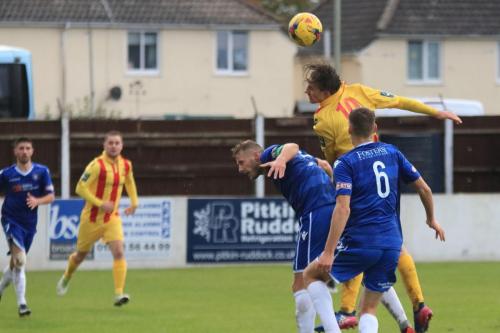 Enfields Sam Youngs (10) wins a header against Rossi Jarvis