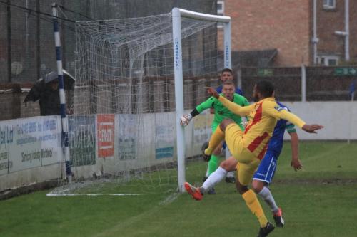 Enfields Taofiq Olomowewe shoots from a tight angle but lifts the ball over the bar