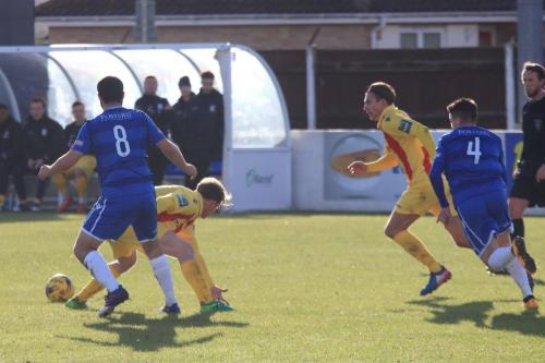 Lowestofts Connor Deeks (8) and Henry Pollock and Enfields Aaron Greene (L) and Sam Youngs