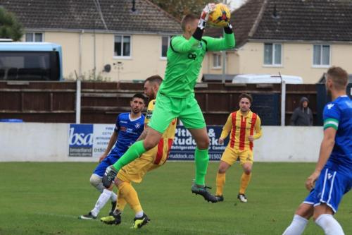 Lowestofts Elvijs Putnins beats Billy Bricknell to a cross
