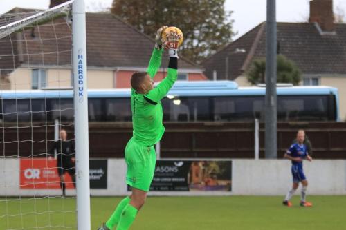 Lowestofts Elvijs Putnins saves under his crossbar