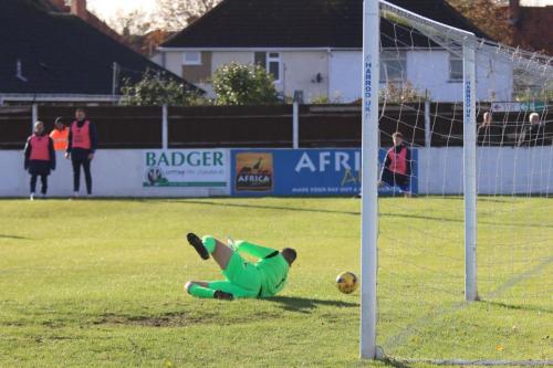 Lowestofts Elvijs Putnins tips a shot past the post