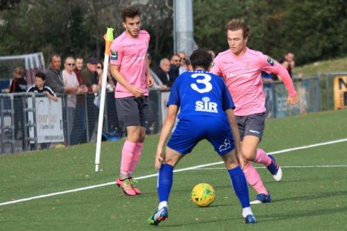 Enfields Mickey Parcell (R) runs at Tom Mills