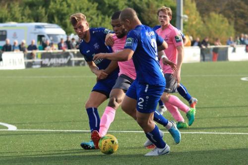 Enfields Taofiq Olomowewe is closed down by Tom Wynter (2) and Ben Swift