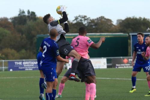 Margate keeper Henry Newombe catches under pressure from Taofiq Olomowewe