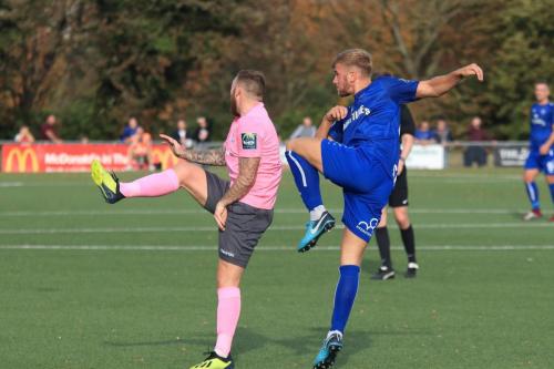 Margates Ben Swift (R) clears from Billy Bricknell