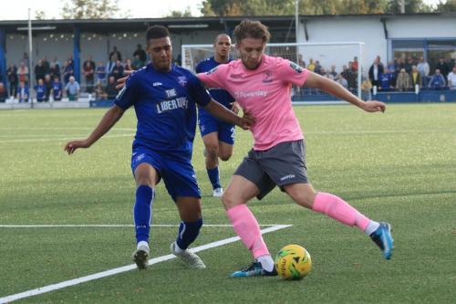 Margates Geroge Brown (L) and Enfields Remi Sutton