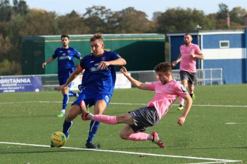 Margates Liam Friend (R) clears from Bilal Sayoud