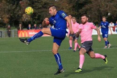 Margates Liam Friend clears from Billy Bricknell