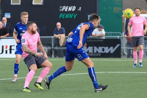 Margates Liam Friend heads clear from Billy Bricknell