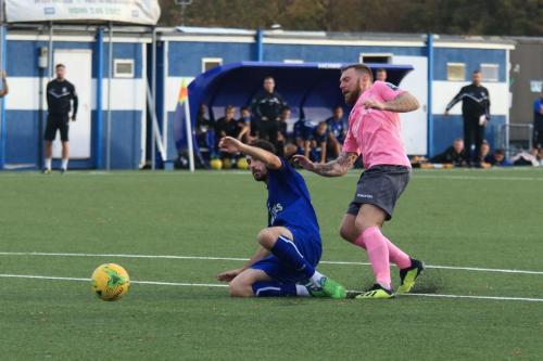 Margates Tom Mills (L) and Enfields Billy Bricknell