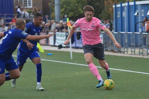 Margates Tom Wynter (L) and George Brown close down Remi Sutton