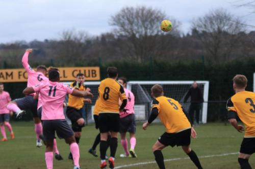 Enfields Dan Rumens (6) heads for goal