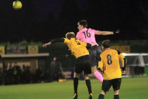 Enfields Josh Davison (16) challenges Oliver Cook