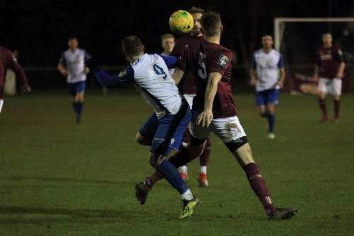 Enfields Billy Bricknell (9) challenges James Budden